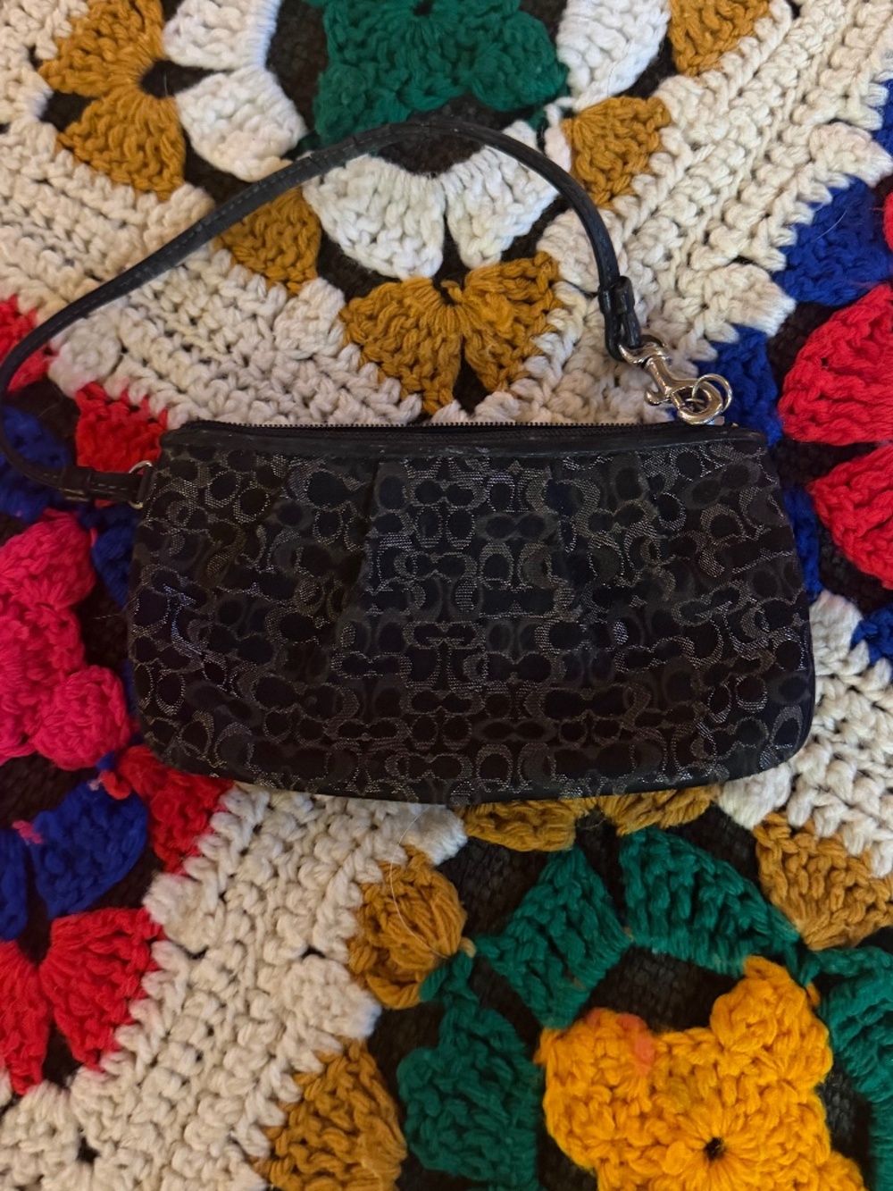 Classic black Coach wristlet